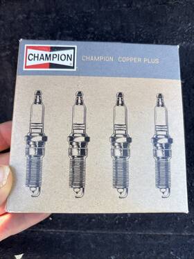 J12yc Champion 037551152254 10 Copper Plus Spark Plug - 4 Pack