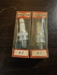 Nors Champion P-7 Spark Plugs (2). Fixed Price $13.00.