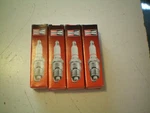 Champion Quantity Four Of #RA8HC/#810 Spark Plugs, Free Shipping. Fixed Price $16.95.