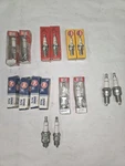 Lot Of 16 Sparkplugs Champion Ngk & Ac. Fixed Price $26.00.