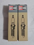 Champion 868 Spark Plug Lot Of 2 New. Fixed Price $11.99.