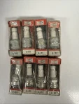 Champion Quantity Eight Of #L-81 Spark Plugs. Fixed Price $25.99.