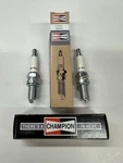 Champion - 810S Copper Plus Resistor Spark Plug, RA8HC 4 Pack. Fixed Price $18.00.