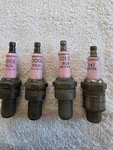 Nos Lodge Pink Spark Plugs, Lot Of 4 Assorted. Fixed Price $25.00.