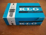 Box Of 12 Nos Klg FE100 Spark Plugs. Fixed Price $100.00.