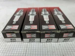 Four! RCJ6Y Spark Plug Champion BPM8Y. Fixed Price $9.90.