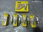 Unused Ngk Spark Plugs Set Of 4 C7HV. Fixed Price $260.00.