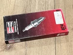 Package Of Champion RL82C Spark Plugs 874M. Fixed Price $6.95.