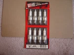 8 Champion Spark Plugs, # J12YC, Nos - Sealed. Fixed Price $25.00.