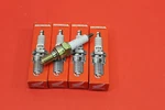 Nos New Ngk Honda Spark Plugs(qty 4) 98059-5991U/IMR9A-9H. Fixed Price $59.95.